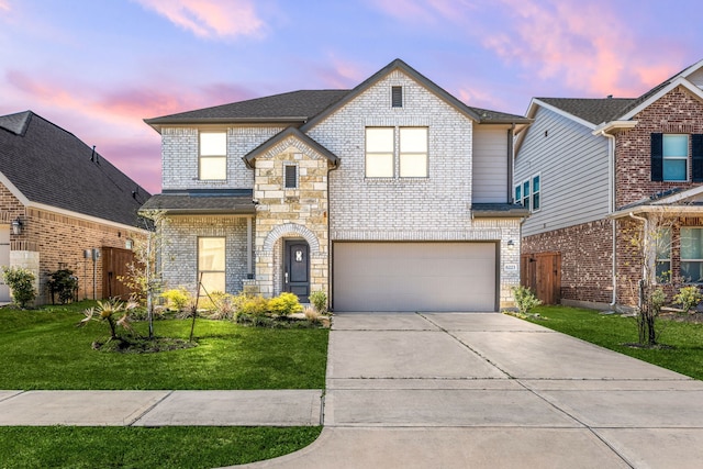 6223 Milbridge Creek Ln, Katy, TX 77493 - view of front of property featuring an attached garage, driveway, and brick siding