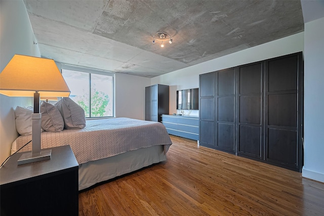 5005 Hidalgo St Unit 410, Houston, TX 77056 - bedroom featuring wood finished floors
