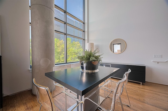 5005 Hidalgo St Unit 410, Houston, TX 77056 - dining space with light wood-style floors