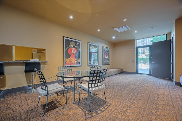 5005 Hidalgo St Unit 410, Houston, TX 77056 - dining room with carpet floors, recessed lighting, and baseboards
