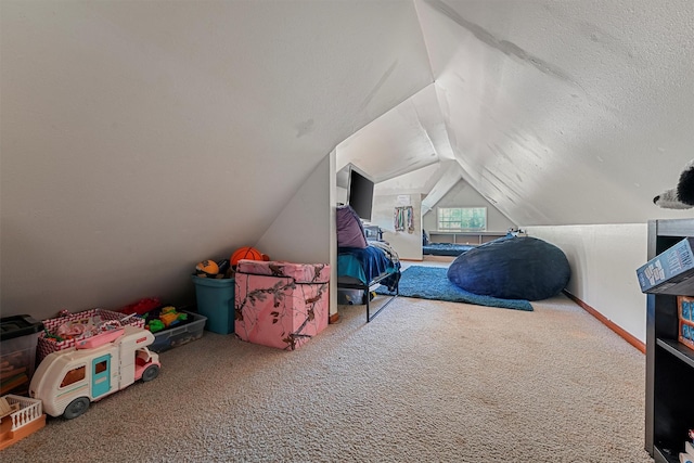 4701 County Road 747a, Brazoria, TX 77422 - recreation room featuring vaulted ceiling, carpet floors, and a textured ceiling