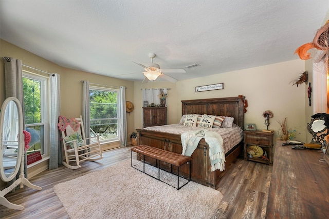 4701 County Road 747a, Brazoria, TX 77422 - bedroom with wood finished floors and a ceiling fan