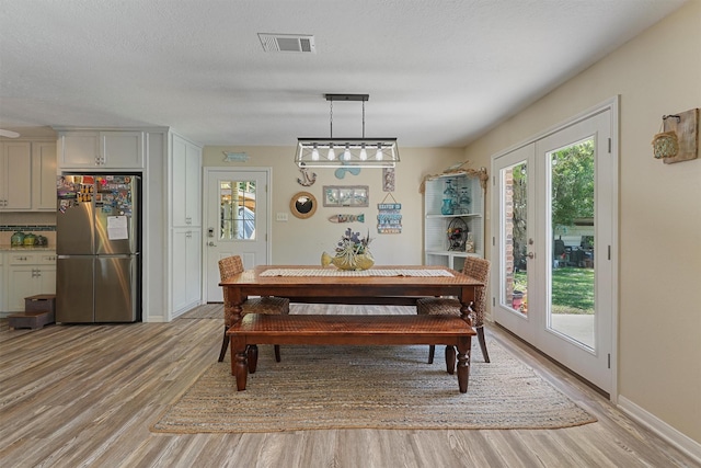 4701 County Road 747a, Brazoria, TX 77422 - dining room featuring light wood finished floors and baseboards