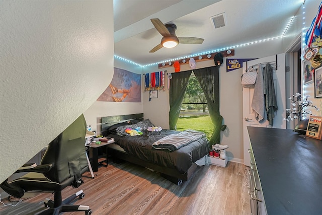 4701 County Road 747a, Brazoria, TX 77422 - bedroom with wood finished floors and ceiling fan
