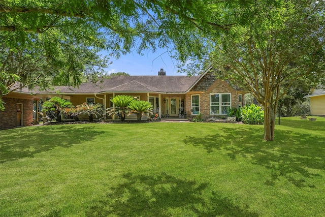 4701 County Road 747a, Brazoria, TX 77422 - single story home featuring a front lawn and a chimney