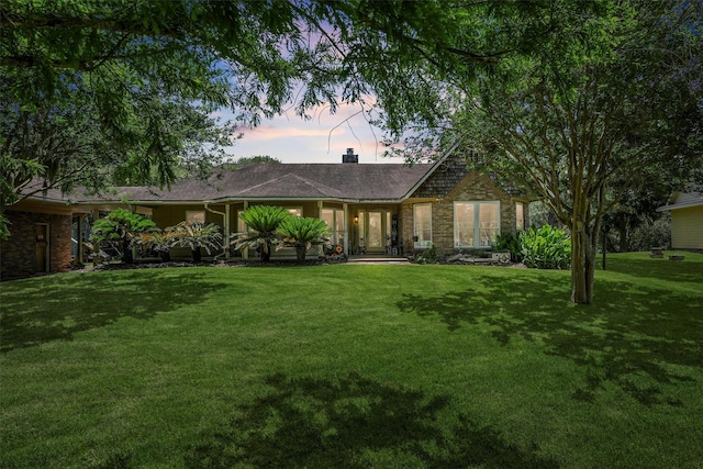 4701 County Road 747a, Brazoria, TX 77422 - ranch-style house with a lawn and a chimney