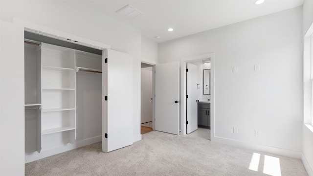 7229 Tierwester St, Houston, TX 77021 - unfurnished bedroom featuring carpet floors, recessed lighting, baseboards, ensuite bathroom, and a closet