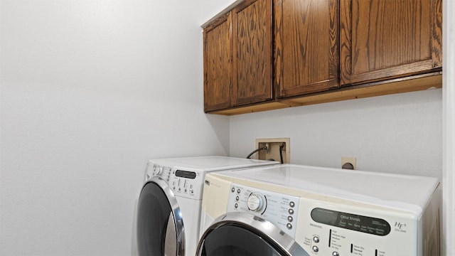 2139 E Settlers Way, The Woodlands, TX 77380 - washroom with cabinet space and separate washer and dryer