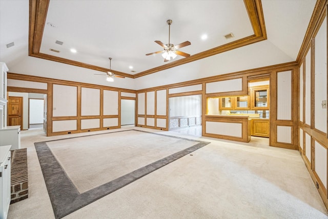 15706 Pinewood Cove Dr, Houston, TX 77062 - spare room featuring ceiling fan, a decorative wall, light colored carpet, lofted ceiling, and ornamental molding