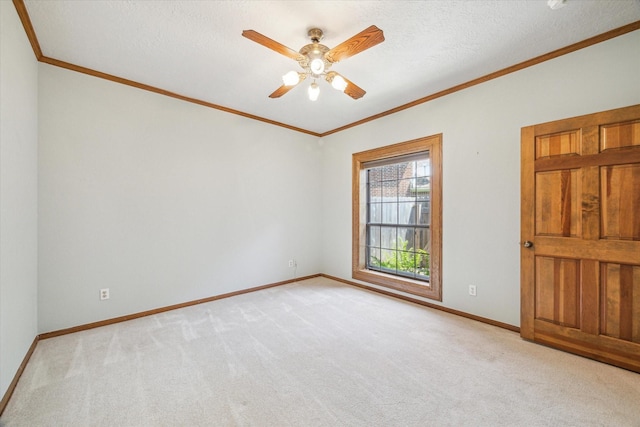 15706 Pinewood Cove Dr, Houston, TX 77062 - empty room with carpet floors, ornamental molding, baseboards, ceiling fan, and a textured ceiling