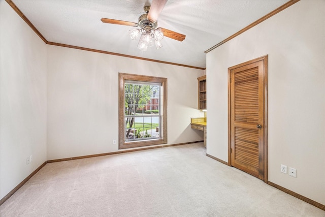 15706 Pinewood Cove Dr, Houston, TX 77062 - unfurnished bedroom with crown molding, light carpet, baseboards, and a ceiling fan