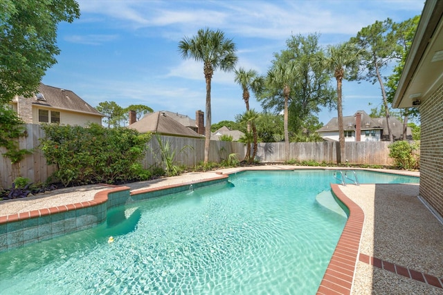 15706 Pinewood Cove Dr, Houston, TX 77062 - view of swimming pool with a fenced backyard