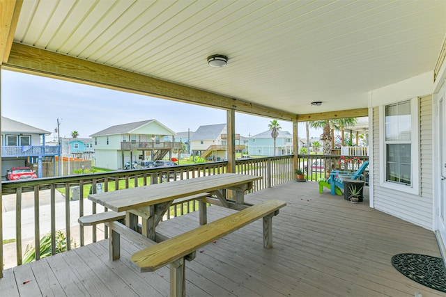 4030 Fort Bend Dr, Galveston, TX 77554 - wooden deck with a residential view