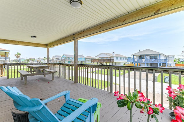 4030 Fort Bend Dr, Galveston, TX 77554 - wooden terrace featuring a residential view