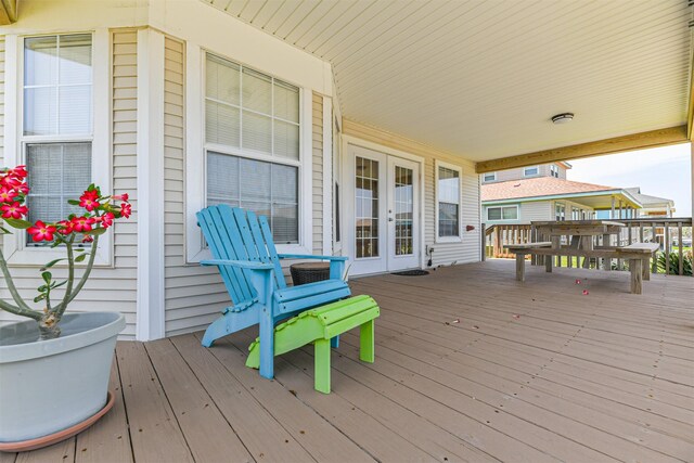 4030 Fort Bend Dr, Galveston, TX 77554 - wooden deck featuring french doors