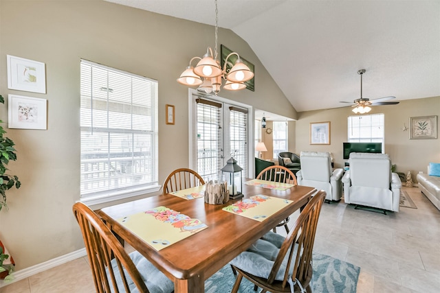 4030 Fort Bend Dr, Galveston, TX 77554 - dining room with a chandelier, vaulted ceiling, ceiling fan, baseboards, and light tile patterned floors