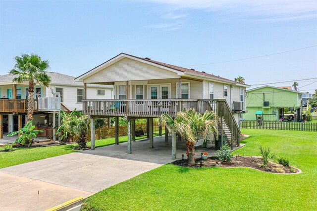 4030 Fort Bend Dr, Galveston, TX 77554 - beach home with a carport, stairs, and driveway