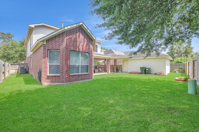 24628 Hosford Meadows Dr, Porter, TX 77365 - back of house with brick siding and central air condition unit