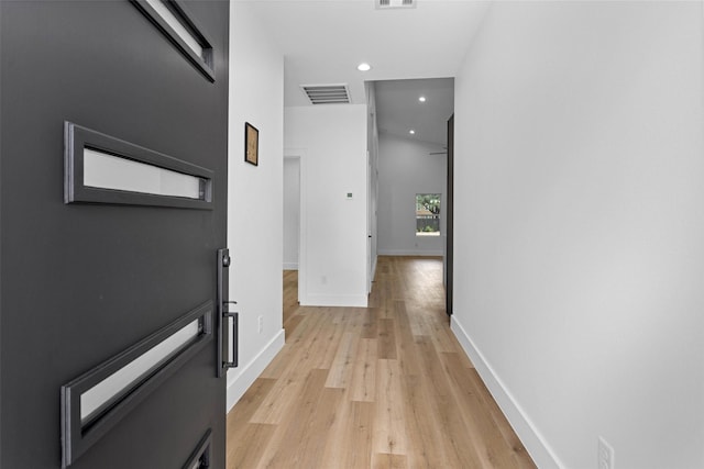 4021 King St, Houston, TX 77026 - hallway with light wood-style flooring, recessed lighting, and baseboards