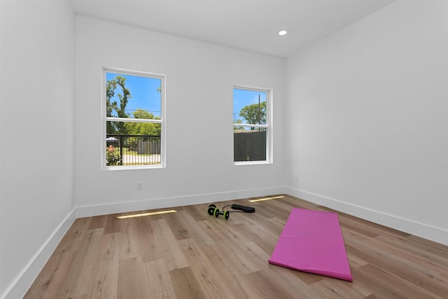 4021 King St, Houston, TX 77026 - spare room with wood finished floors, baseboards, and recessed lighting