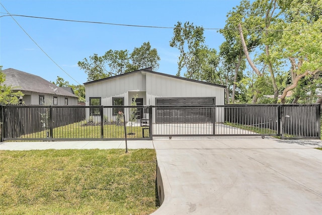 4021 King St, Houston, TX 77026 - view of outbuilding featuring a gate, a garage, and driveway