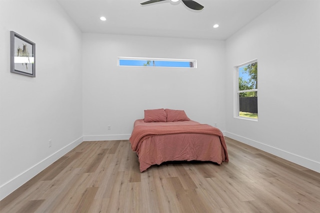 4021 King St, Houston, TX 77026 - bedroom with light wood-type flooring, baseboards, a ceiling fan, and recessed lighting