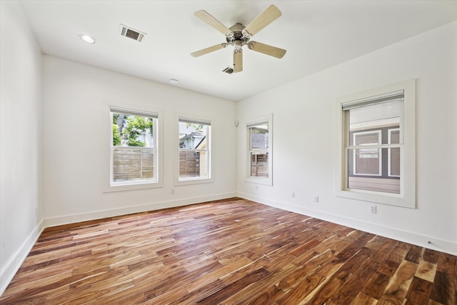924 E 27th St, Houston, TX 77009 - spare room with wood finished floors, baseboards, a ceiling fan, and recessed lighting