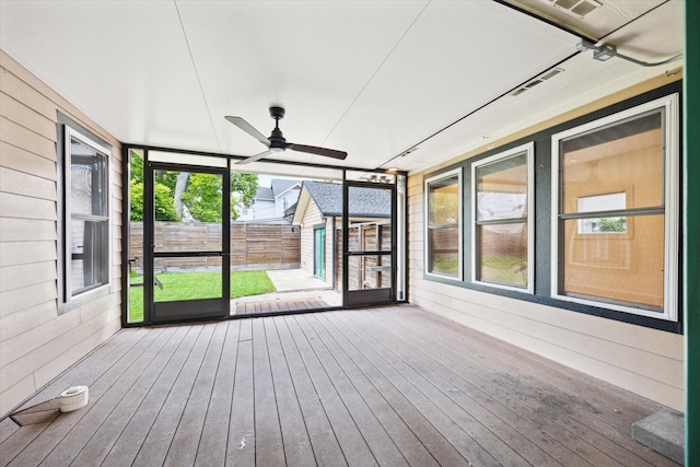 924 E 27th St, Houston, TX 77009 - unfurnished sunroom with ceiling fan and plenty of natural light