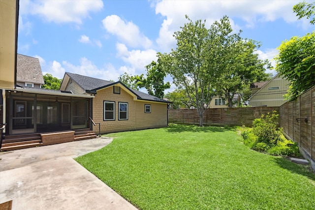 924 E 27th St, Houston, TX 77009 - view of yard featuring a sunroom, a patio, and entry steps