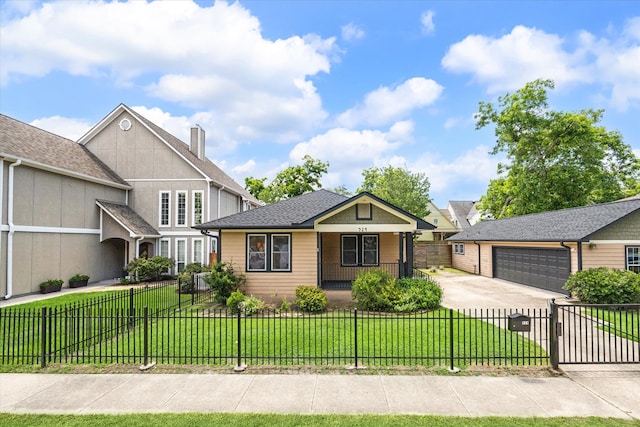 924 E 27th St, Houston, TX 77009 - view of front of home featuring covered porch, a garage, and concrete driveway