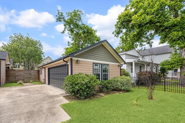 924 E 27th St, Houston, TX 77009 - view of front of property featuring a garage