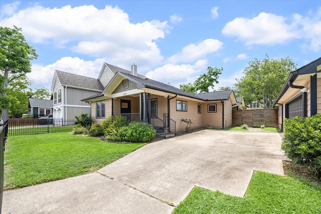 924 E 27th St, Houston, TX 77009 - view of front of house featuring a chimney, roof with shingles, and a porch