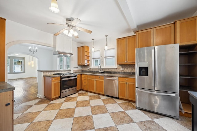924 E 27th St, Houston, TX 77009 - kitchen with stainless steel appliances, open shelves, a ceiling fan, backsplash, and dark countertops