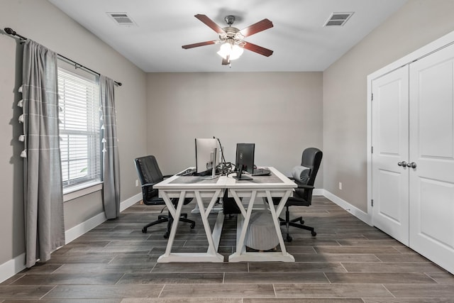 8729 Nathan Dr, Waller, TX 77484 - office featuring a ceiling fan, healthy amount of natural light, dark wood-style floors, and baseboards