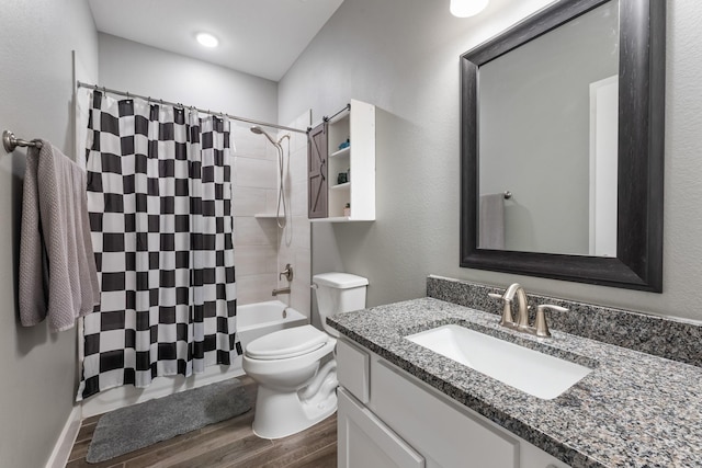 8729 Nathan Dr, Waller, TX 77484 - bathroom featuring wood finished floors, shower / bathtub combination with curtain, vanity, and toilet