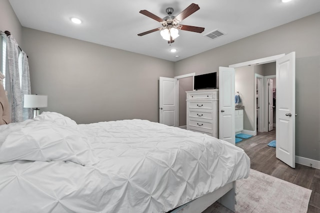 8729 Nathan Dr, Waller, TX 77484 - bedroom featuring baseboards, dark wood-style floors, recessed lighting, and ceiling fan