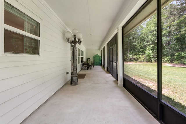 8729 Nathan Dr, Waller, TX 77484 - unfurnished sunroom featuring a chandelier