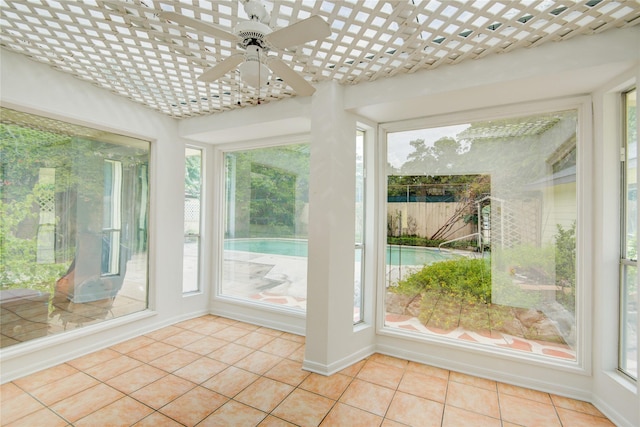 5211 Olympia Fields Ln, Houston, TX 77069 - unfurnished sunroom featuring plenty of natural light and tile patterned floors