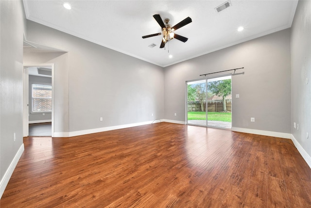 unfurnished room with a ceiling fan, wood finished floors, ornamental molding, baseboards, and recessed lighting