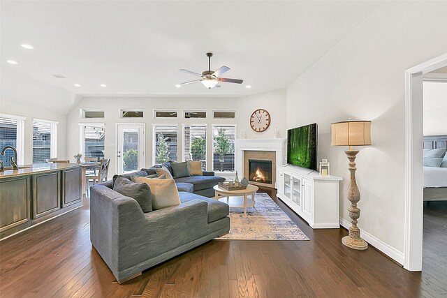 16819 Big Reed Dr, Humble, TX 77346 - living room featuring ceiling fan, healthy amount of natural light, recessed lighting, dark wood-style flooring, and baseboards