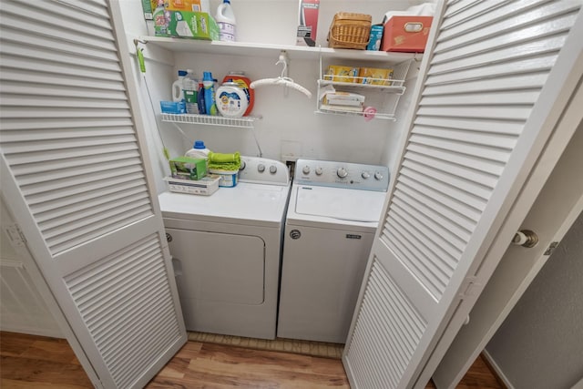 14911 Wunderlich Dr Unit 1501, Houston, TX 77069 - laundry room featuring washing machine and dryer and light wood finished floors