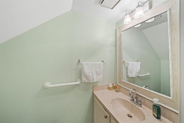 14911 Wunderlich Dr Unit 1501, Houston, TX 77069 - bathroom with lofted ceiling and vanity