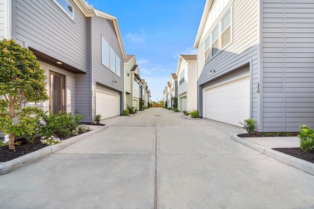 9 Wellford St Unit F, Houston, TX 77022 - view of concrete road featuring a residential view