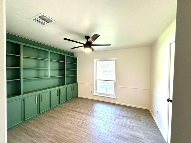 3007 Broadmoor Dr, Sugar Land, TX 77478 - unfurnished room featuring light wood-style floors and a ceiling fan