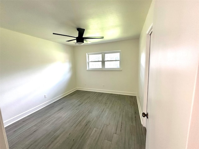 3007 Broadmoor Dr, Sugar Land, TX 77478 - unfurnished room featuring a ceiling fan, baseboards, and dark wood-type flooring