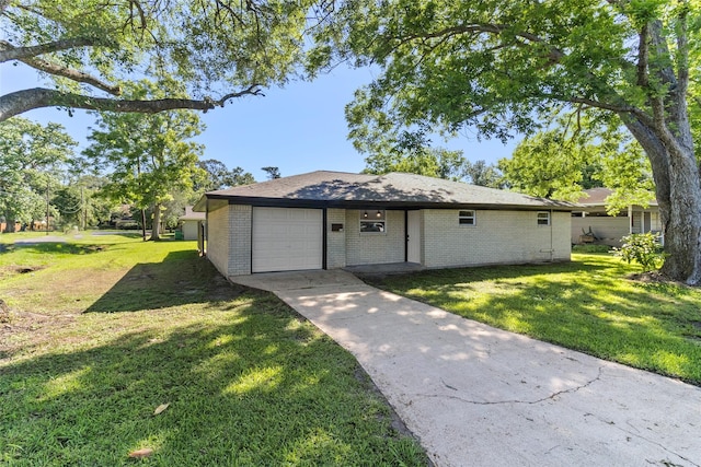 401 S Fig St, Sweeny, TX 77480 - ranch-style house featuring a garage, brick siding, a front lawn, and concrete driveway