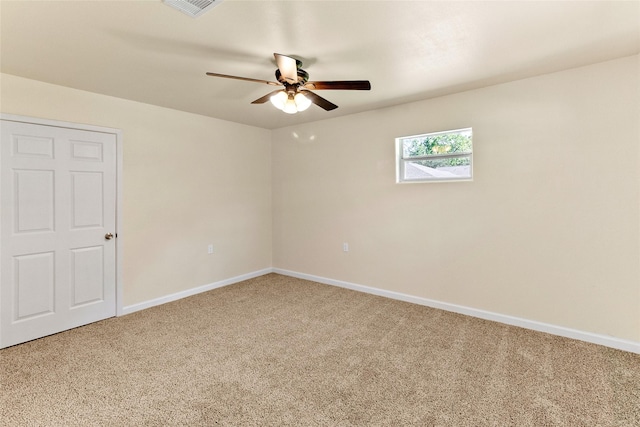 401 S Fig St, Sweeny, TX 77480 - empty room with carpet flooring, a ceiling fan, and baseboards