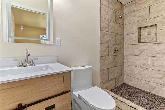 401 S Fig St, Sweeny, TX 77480 - full bathroom with toilet, tiled shower, and vanity