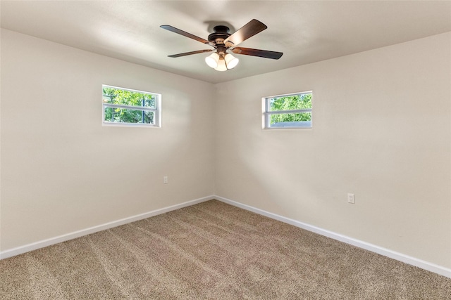 401 S Fig St, Sweeny, TX 77480 - carpeted spare room featuring plenty of natural light, baseboards, and ceiling fan