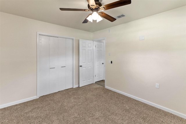 401 S Fig St, Sweeny, TX 77480 - unfurnished bedroom featuring baseboards, carpet, a closet, and ceiling fan
